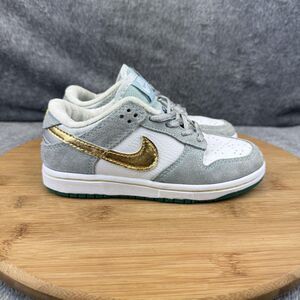 Nike Kids Sneakers in Gray, White, and Gold